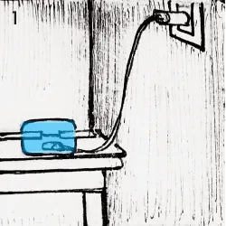 1. The clip-on monitor charges on its case by the bed